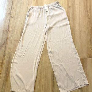 NWT! H&M Wide leg silk like (not silk) pants with pockets .